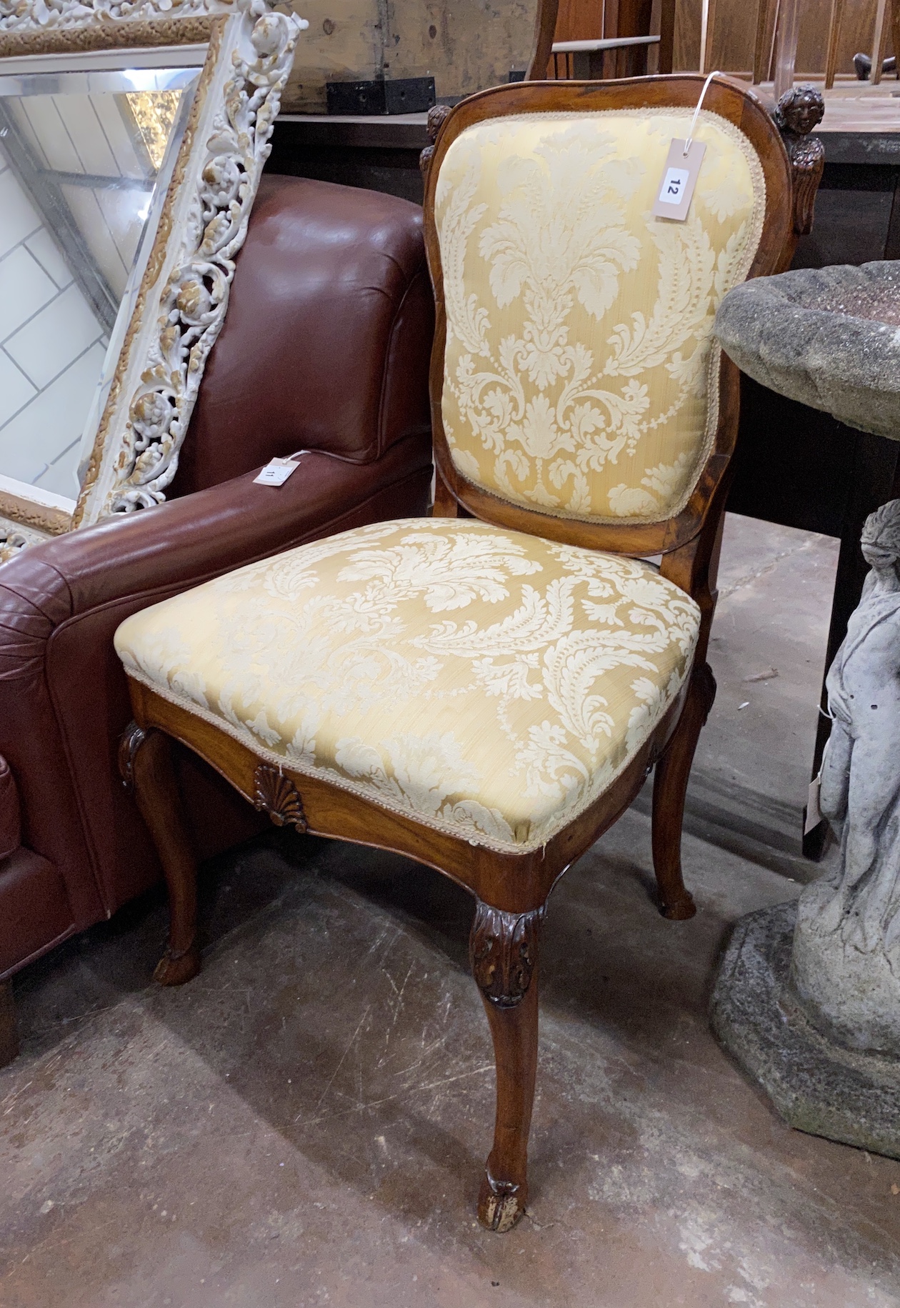 A George II carved walnut dining chair, width 55cm, depth 47cm, height 97cm